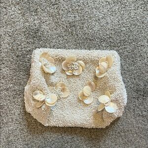 Beige Textured Clutch with Shell Flower Embellishments